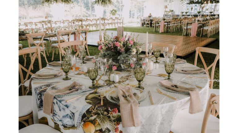 Garden terrace tables with florals and green goblets